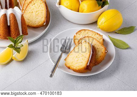 Lemon Bundt Cake Drizzled With Powdered Sugar Glaze