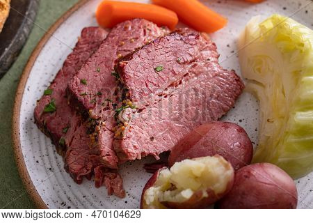 Corned Beef With Cabbage And Potatoes Dinner With Soda Bread