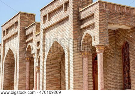 Hisor, Tajikistan - July 31, 2022: Ancient Hisor Fort In Summer Against The Blue Sky.