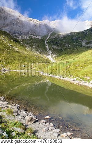 Carnic Alps And Small Mountain Lake, Carnian Alps Mountains, Austria