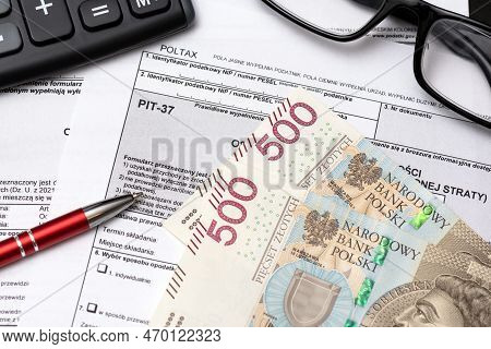 Polish Tax Form, Polish Banknotes. Tax Income With Polish Tax Forms And Money