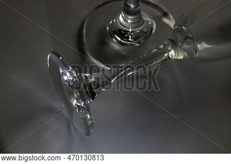 Two Wine Glsses On A Black Background