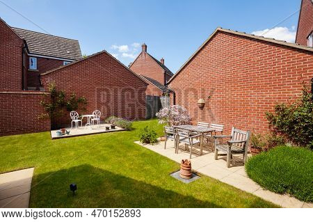 Longstanton, Cambridgeshire, England - May 16 2019: Typical Landscaped Garden Space On Modern Housin