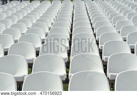 Seats Of Tribune On Sport Stadium. Concept Of Fans, Chairs For Audience, Cultural Environment Concep