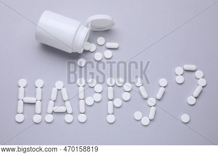 Question Happy Made Of Antidepressants And Medical Bottle On Grey Background, Flat Lay