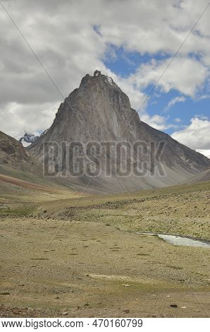 A Beautiful Sacred Mount Gumbok Rangan (gonbo Rangjon) With Flowing Kargyak River In Darcha-padum Ro