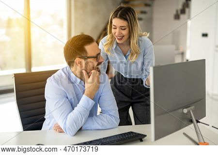 Portrait Of Dedicated Female Operator Agent Working At It Support Sector