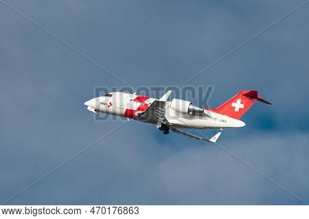 Zurich, Switzerland, January 20,2023 Rega Swiss Air Ambulance Bombardier Challenger 650 Aircraft Tak