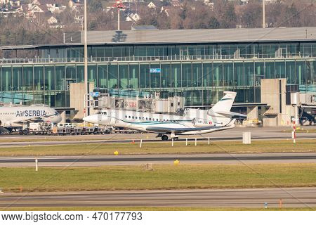 Zurich, Switzerland, January 20,2023 Dessault Falcon 8x Business Aircraft Is Taking Off From Runway 