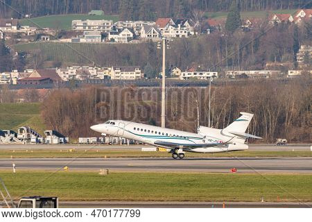 Zurich, Switzerland, January 20,2023 Dessault Falcon 8x Business Aircraft Is Taking Off From Runway 