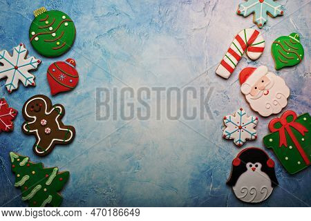 Christmas Gingerbread And Sugar Cookies Decorated With Royal Icing Background With Copy Space