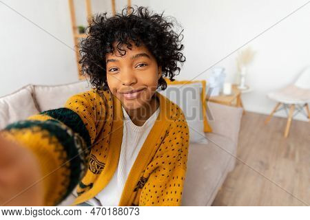 Happy African American Teen Girl Blogger Smiling Face Talking To Webcam Recording Vlog. Social Media