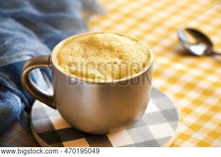 Vanilla Mugcake Is Microwaved. Homemade Cupcake In A Coffee Mug.