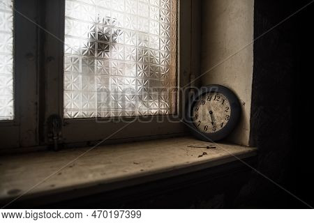 Old And Vintage Blank Clock Dial Without Hand On Old Wooden Table