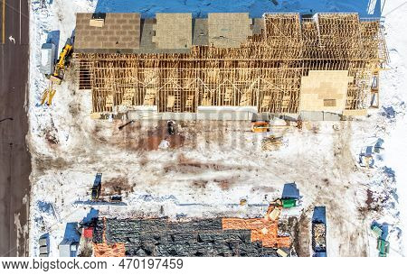 Aerial Drone View Of A Multifamily Apartment Complex Under Construction.