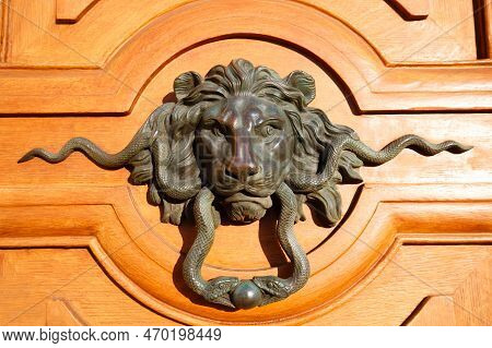 European Vintage Old Metal Wrought Iron Door Knocker. Design Detail. Paris.