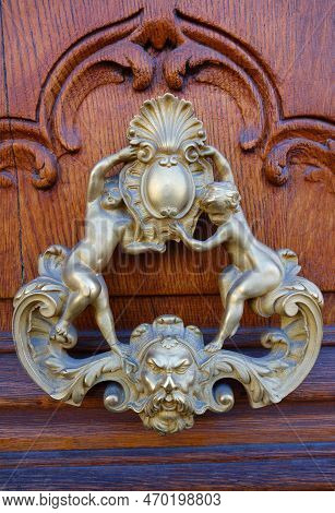 European Vintage Old Metal Wrought Iron Door Knocker. Design Detail. Paris.