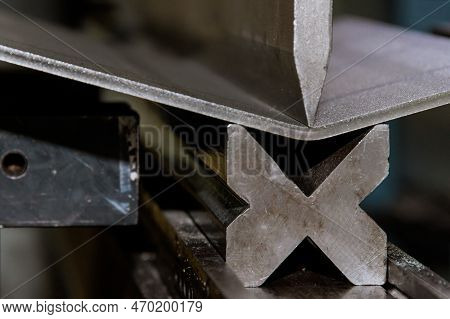 An Hydraulic Machine, Which Has Been Designed To Bend Sheet Metal, Is Used For Bending Sheet Metal.