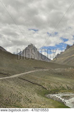 A Beautiful Sacred Mount Gumbok Rangan (gonbo Rangjon) With Flowing Kargyak River In Darcha-padum Ro