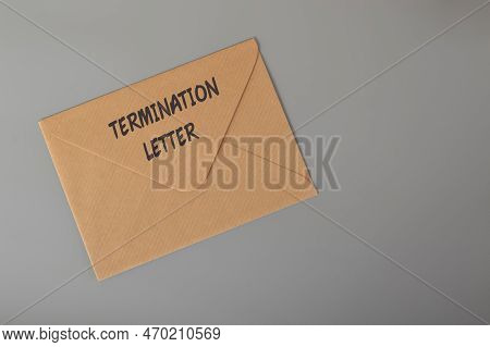 Brown Envelope Written With Termination Letter. Unfair Dismissal Concept.