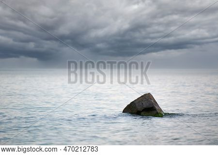 Dramatic Seascape With Cloudy Storm Warning On Horizon. Rain Clouds Over Water, Strong Wind. Stone I