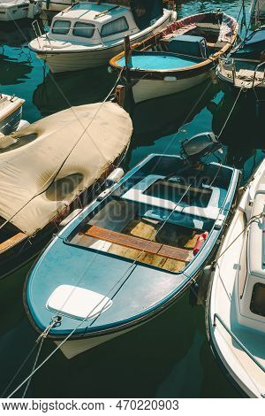 Fishing Dinghy Boats Moored In Small Marina In Town Of Lovran, Croatia. Selective Focus.
