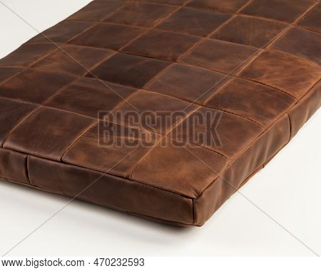 Decorative Seat Cushion From Brown Leather Patches