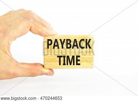 Payback Time Symbol. Concept Words Payback Time On Wooden Blocks. Beautiful White Table White Backgr