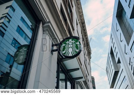 London, Uk - February 02, 2023: Logo Sign Outside A Starbucks Cafe In City Of London. Starbucks Is A