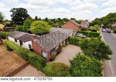 Ditton Green, Suffolk, England - July 24 2018: Rooftop View Of Village Bungalows And Houses Viewed F
