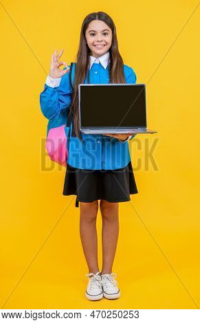 School Girl Presenting Estudy Education Isolated On Yellow, Ok. School Girl Presenting Estudy