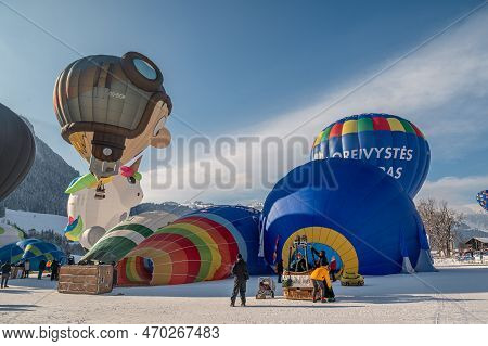 Chateau-d'oex,vaud, Switzerland - 23 January 2023: Hot Air Balloon. People Working For The Preparati