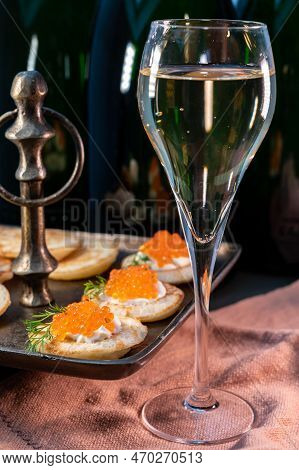 Tasting Of Rose Brut Champagne Sparkling Wine With Red Caviar In Cellars Of Gran Cru Wine House In E