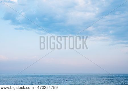 Background Of Sky And Sea, Sea Is Very Calm With Gentle Ripples, Sky Perfectly Clear. Calm Sea And B