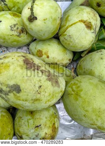 Green Mango Fruit Close-up On Sale In The Market Stall