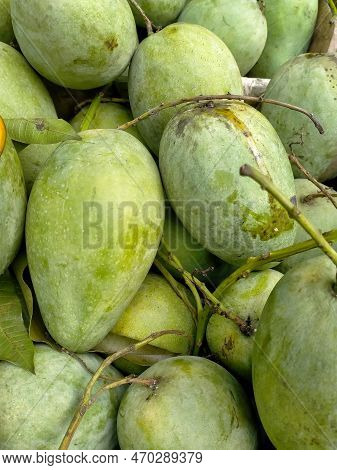 Green Mango Fruit Close-up On Sale In The Market Stall