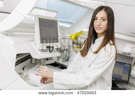 Young Woman In The Modern Medical Laboratory