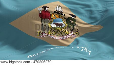 Close-up View Of The Delaware State Flag Fluttering. Colonial Blue Background With A Buff-colored Di