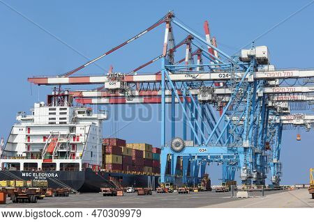 Shipping Port Of Haifa, Israel - October 25, 2021: Crane And Vehicle Activity At The Ship Port.