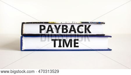 Payback Time Symbol. Concept Words Payback Time On Books. Beautiful White Table White Background. Bu