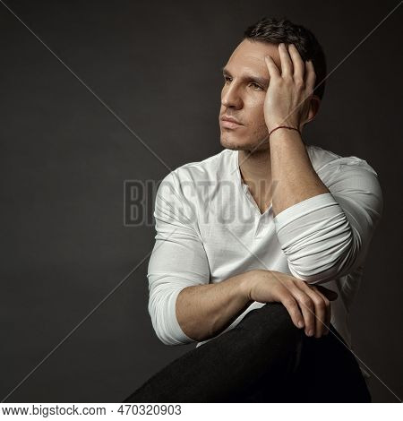 Handsome Fashion Man. Elegant Unsaved Men Face Portrait In White Shirt Over Dark Gray Background. Se