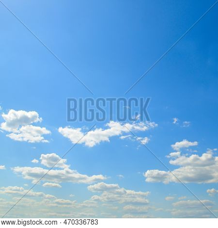 A Cblue Sky And Light Cumulus Clouds.