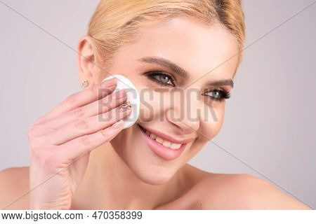 Close Up Woman Cleaning Face With A Cotton Pad. Skincare, Cotton Pad And Woman Cleaning Face On Stud