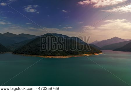 Landscape Of Zhinvali Reservoir Lake Landscape With Mountains Along The Main Caucasus Ridge In Georg