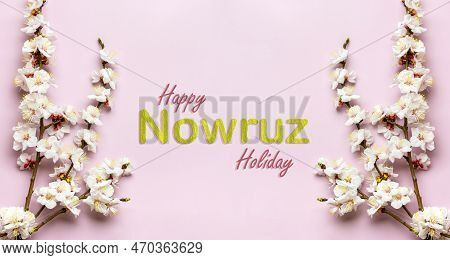 Sprigs Of The Apricot Tree With Flowers On Pink Background Text Happy Nowruz Holiday Concept Of Spri