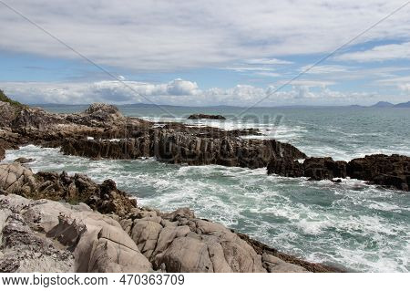 The View Of Seascape With Rocks And Blue Sea In A Sunny Day, Near Mangawhai Heads, Auckland, New Zea