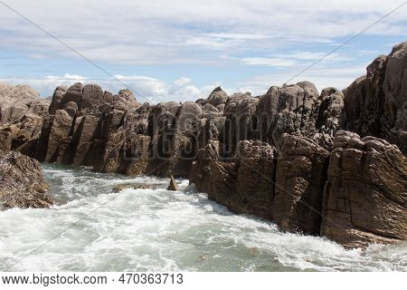 The View Of Seascape With Rocks And Blue Sea In A Sunny Day, Near Mangawhai Heads, Auckland, New Zea