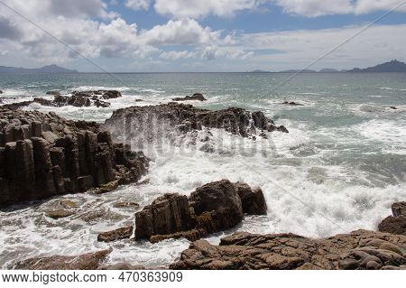 The View Of Seascape With Rocks And Blue Sea In A Sunny Day, Near Mangawhai Heads, Auckland, New Zea