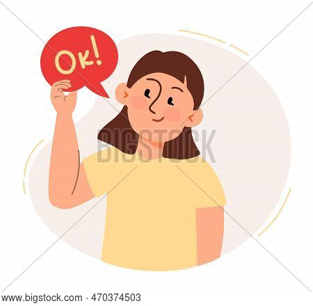 A Woman Holds A Speech Cloud With The Inscription Ok. The Concept Of A Business Idea, Startup, Organ