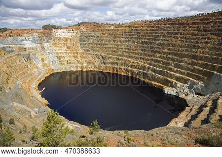 Inactive Quarry Corta Atalaya With A Red Lake At The Bottom. Minas De Riotinto, Spain.